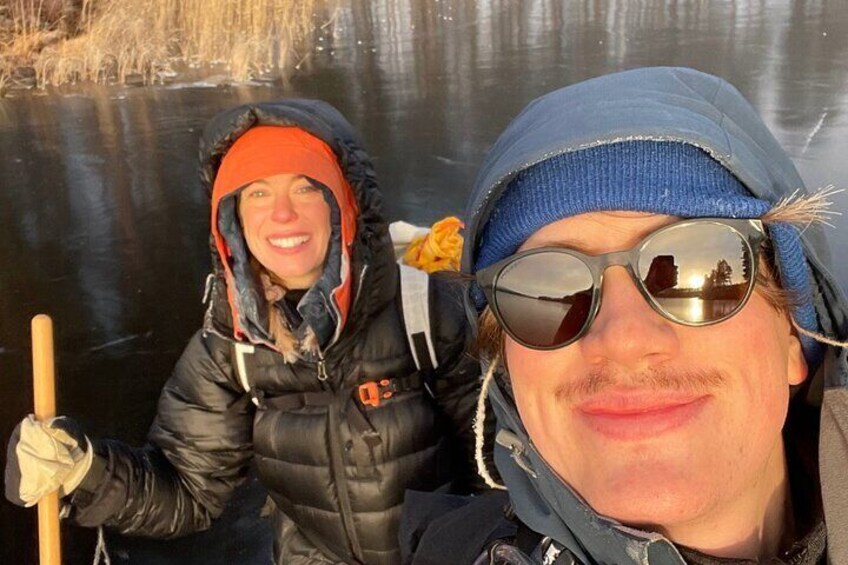 Glad couple with sunshine in their face.