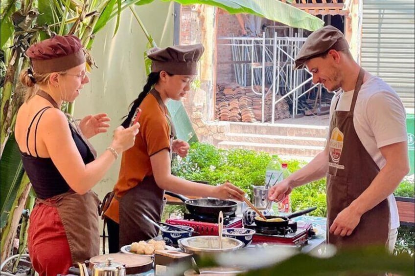 Hue Cooking Class & Local Market Tour by Cyclo with Madam Thu