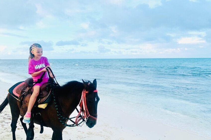 Adventure awaits! Join us for a delightful horseback ride along the turquoise waters! ✨"