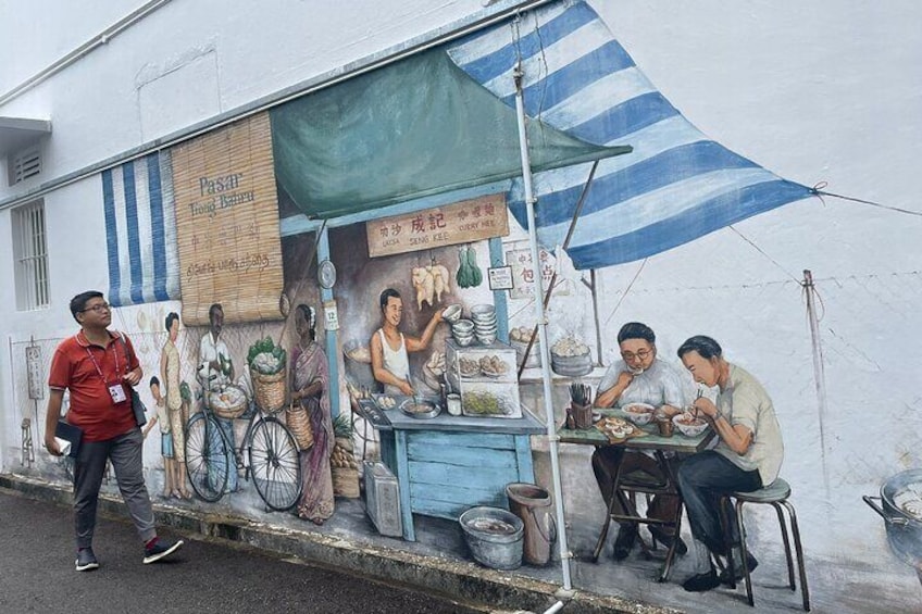 Murals depicting old Singapore food and trades. 