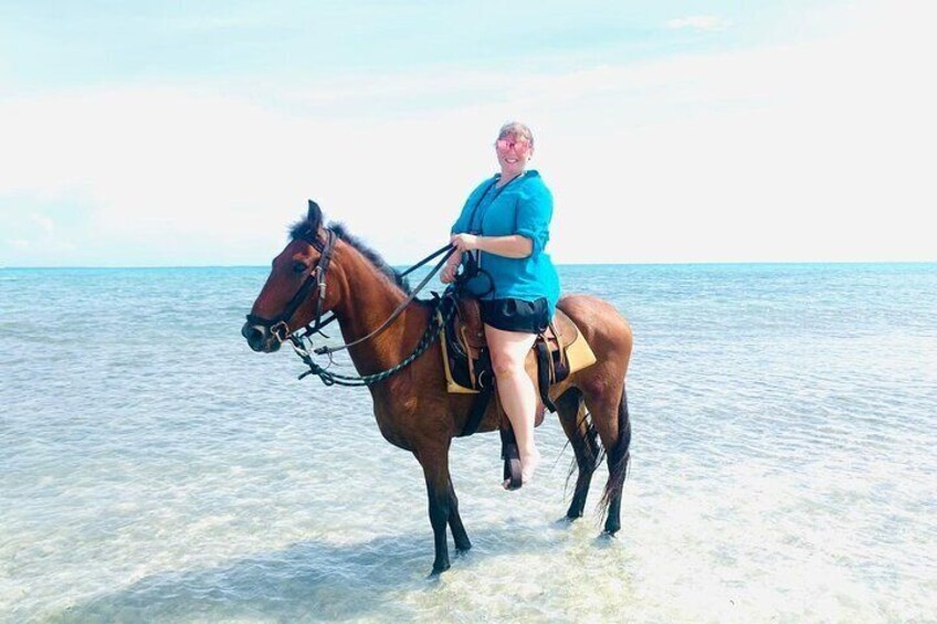 Your personal beach adventure awaits! Embark on a 60-minute private ride through the turquoise waters of Turks and Caicos. 