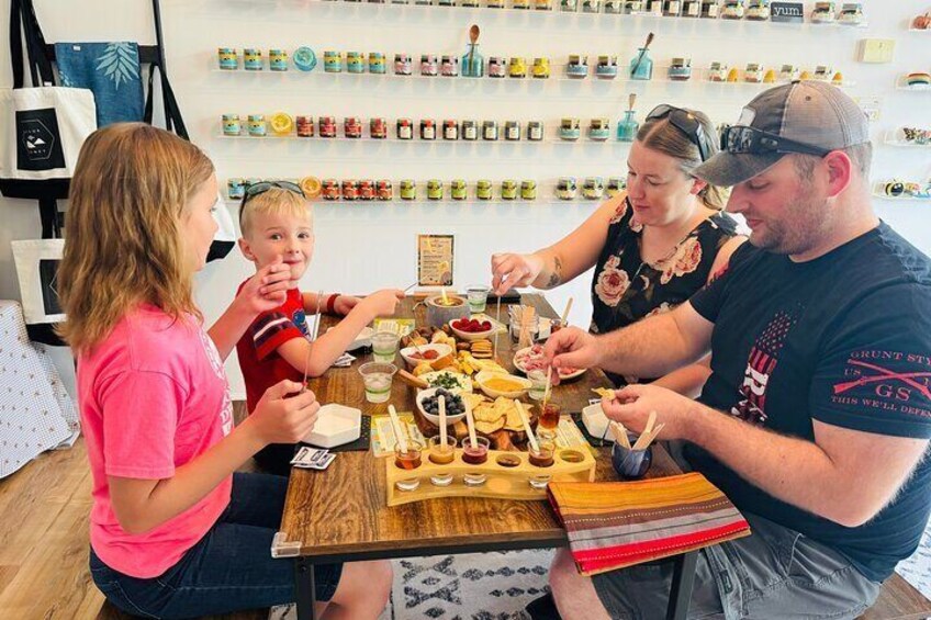 A family enjoying honey flight and bites