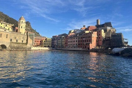 Boat ride from Riomaggiore with stop for swimming and local wine.