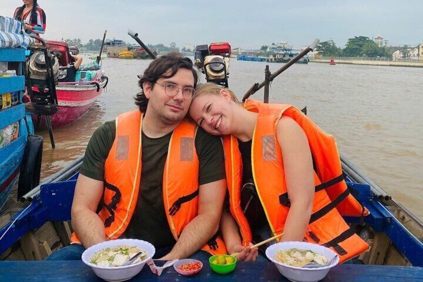 Breakfast on boat in floating market