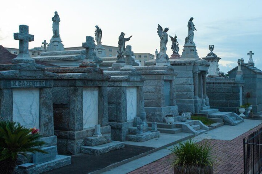 Visitors are greeted by an august assemblage of stone tombs and statues.