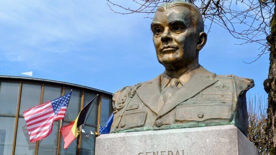 Visit General McAuliffe's statue in downtown Bastogne, commander of the 101st Airborne Division during the Siege of Bastogne.