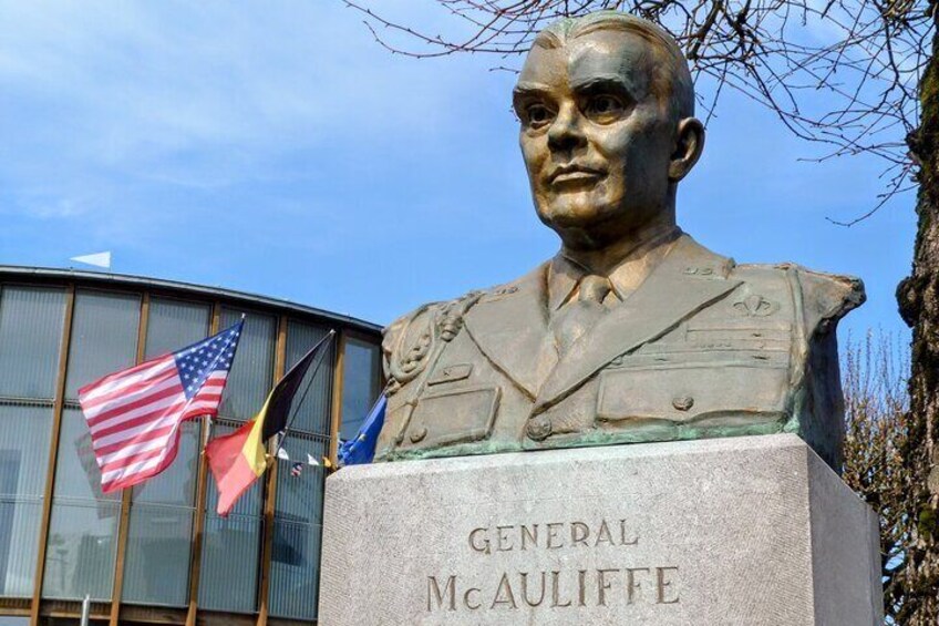 Visit General McAuliffe's statue in downtown Bastogne, commander of the 101st Airborne Division during the Siege of Bastogne.
