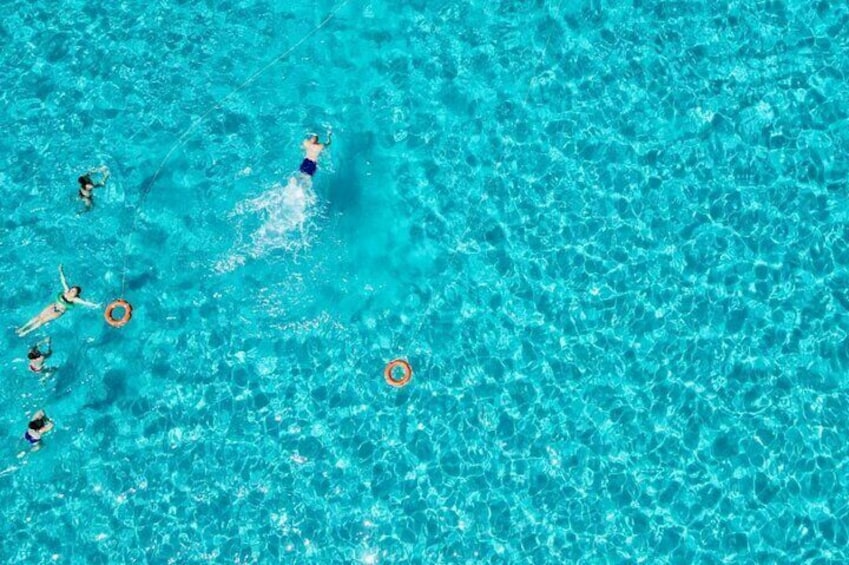 Stintino Half Day Catamaran Tour to La Pelosa with Aperitif