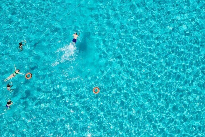 Stintino Half Day Catamaran Tour to La Pelosa with Aperitif