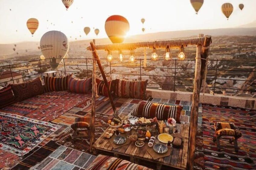 Breakfast with Balloons and Sunrise View at Terrace in Cappadocia