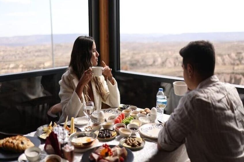 Breakfast with Balloons and Sunrise View at Terrace in Cappadocia