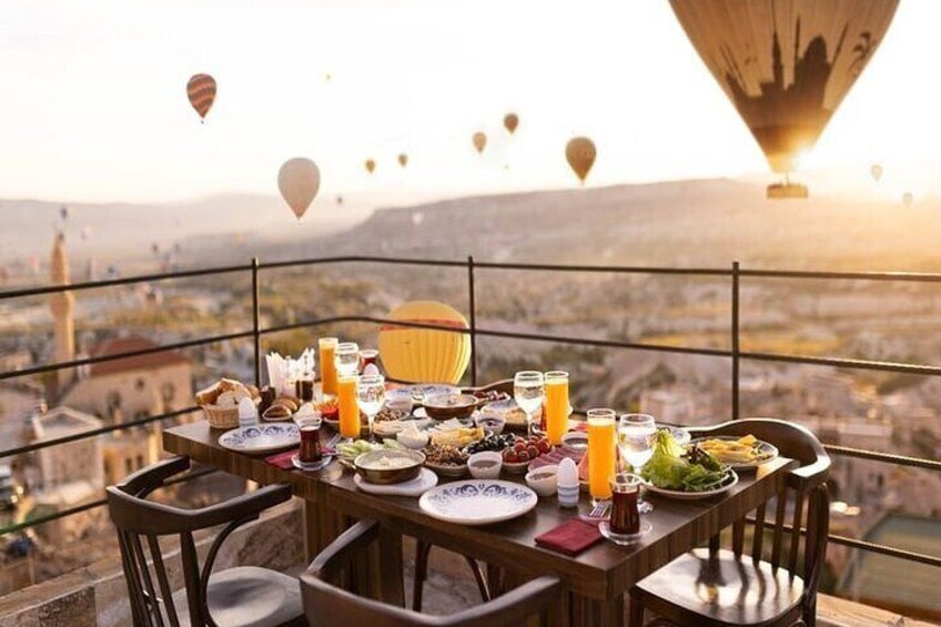 Breakfast with Balloons and Sunrise View at Terrace in Cappadocia