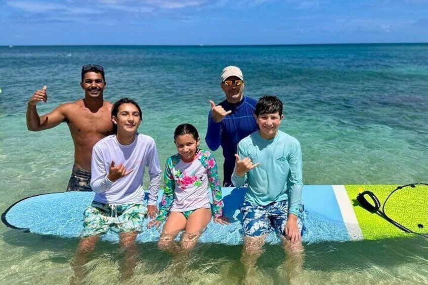 Family of 4 enjoying the North Shore waves