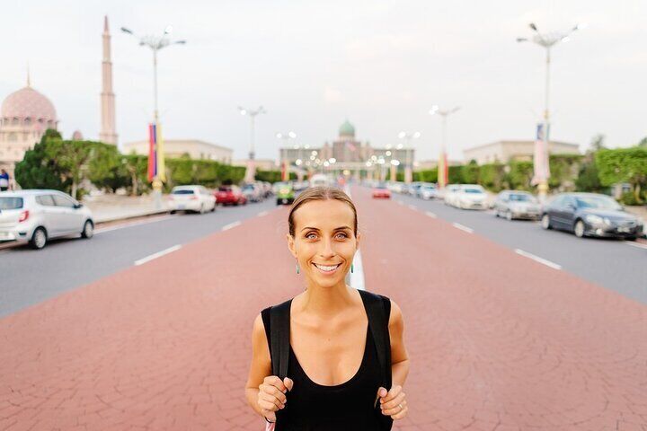 Woman tourist is sightseeing Putrajaya Mosque