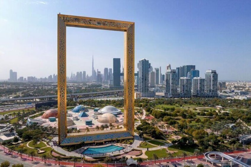 As the bus drives along the Dubai Frame, you'll be mesmerized by its striking design, offering a unique view of both old and new Dubai.