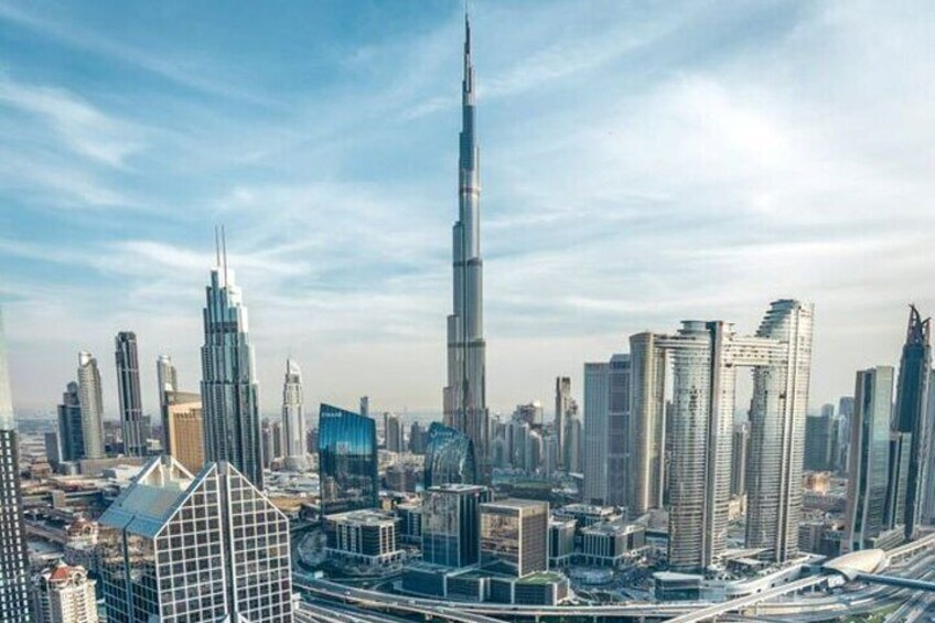 As the bus drives through Downtown Dubai, you'll be surrounded by stunning skyscrapers, luxury shopping centers, and vibrant streets, capturing the essence of the city's dynamic energy.