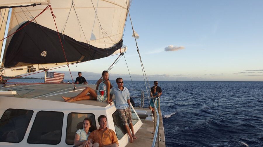 Group enjoying the views aboard the Waikiki Sunset Cocktail Cruise