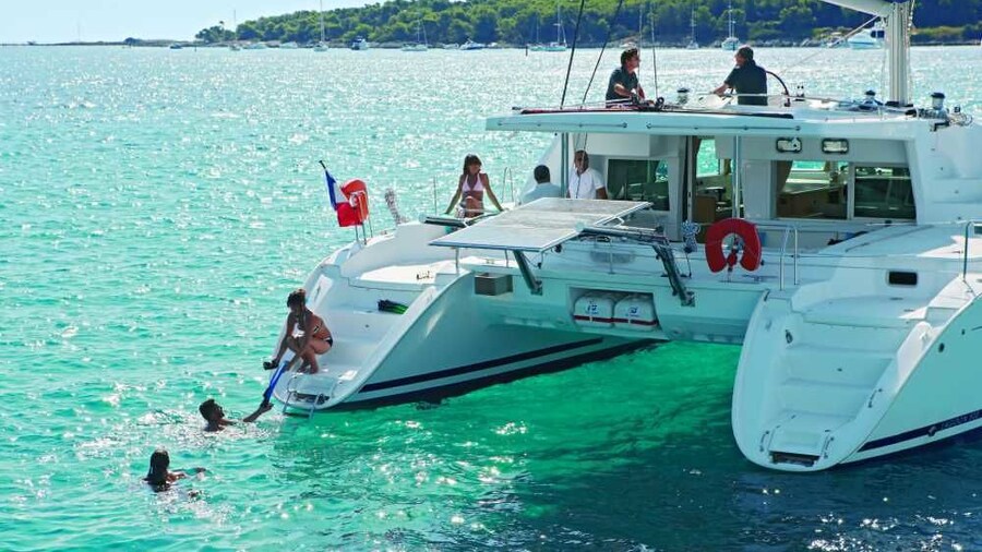 Guests enjoying their time on a luxurious catamaran vessel in Kona