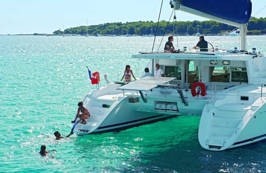 Guests enjoying their time on a luxurious catamaran vessel in Kona 