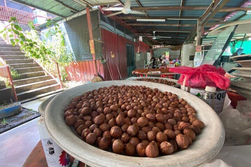 Drying the nutmeg seed.