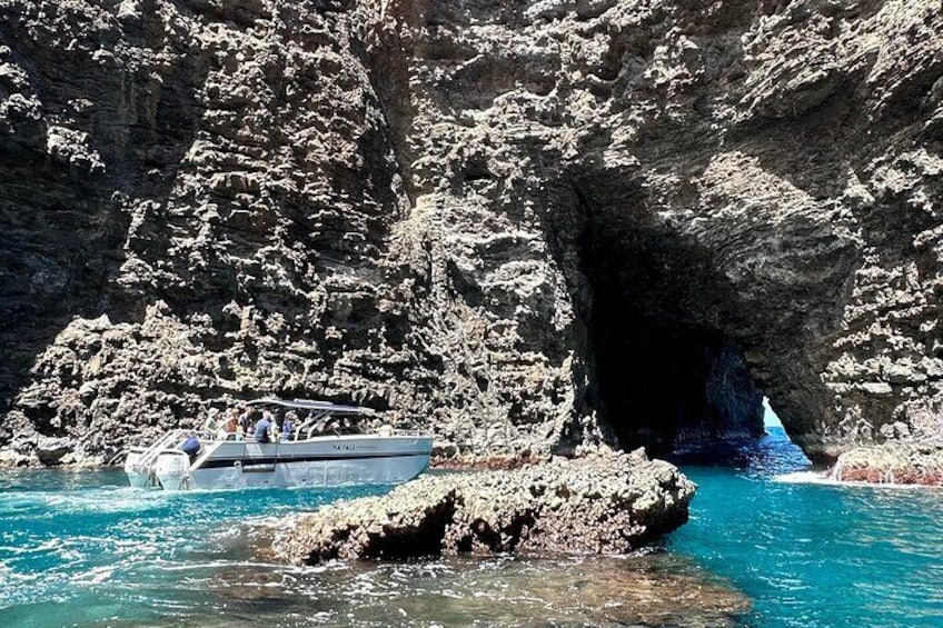 Our Deluxe Power Catarman sneaking out of another sea cave along the beautiful Na Pali Coast!