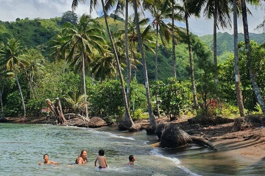 Tahitis famous black sandy beaches - such a contrast to the outer islands