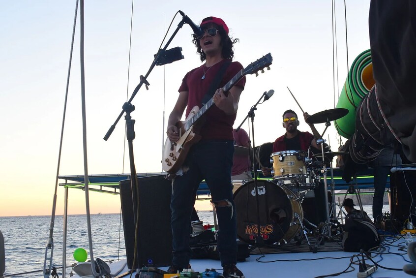 Shared Sunset Catamaran at Los Cabos with Open Bar, Dinner & Live Music