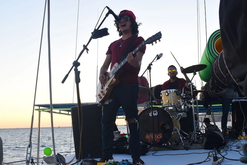 Shared Sunset Catamaran at Los Cabos with Open Bar, Dinner & Live Music