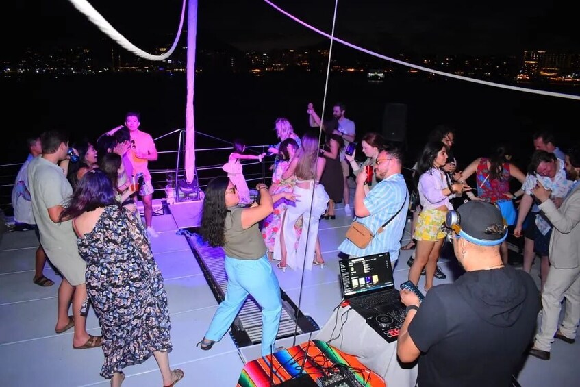 Shared Sunset Catamaran at Los Cabos with Open Bar, Dinner & Live Music