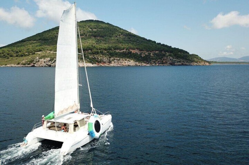 Porto Conte Half-day catamaran tour with aperitif