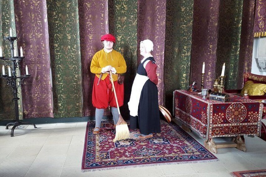 Costumed actors in the Queen's Bed Chamber
