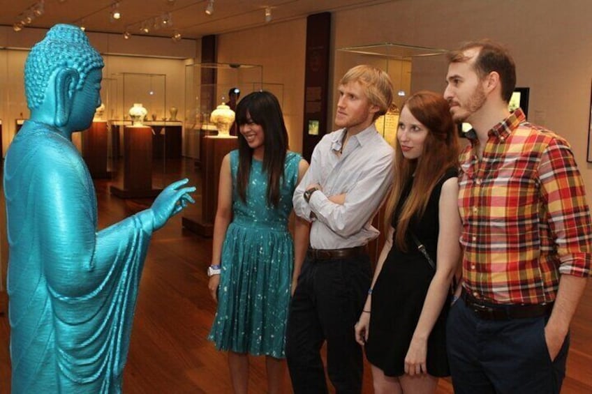 Patrons enjoying Asian works within the Caroline Wiess Law Building 