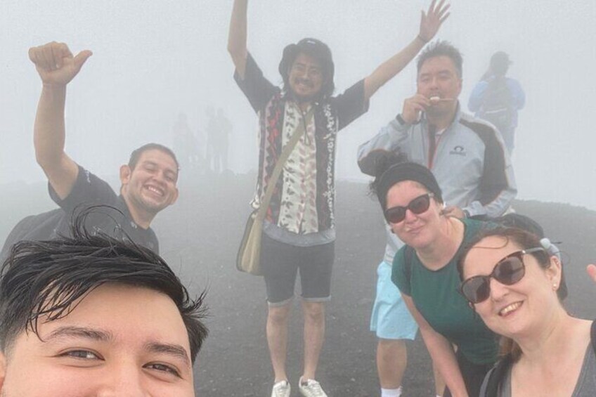Tourists enjoying the beautiful crater of Santa Ana Volcano