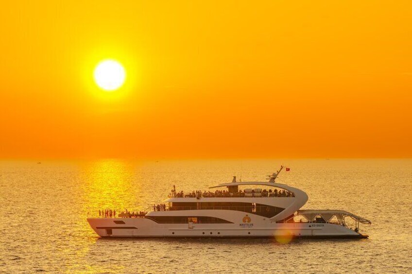 Witness the magic of Phu Quoc sunset with a sunset cruise & dining experience on the Nautilus yacht.