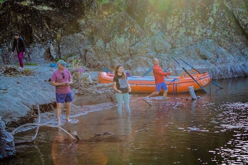 Skipping rocks on the Rogue River in the evening