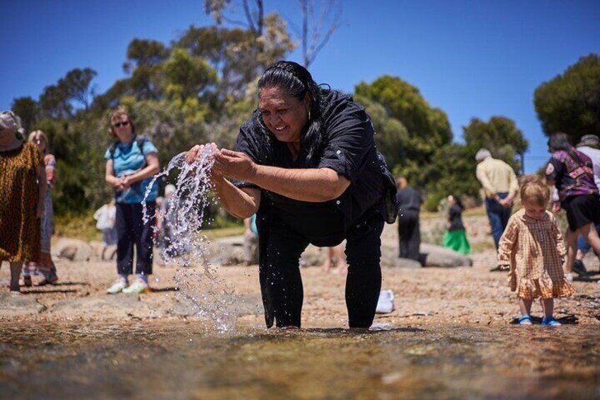 Participate in a traditional water cleansing ceremony