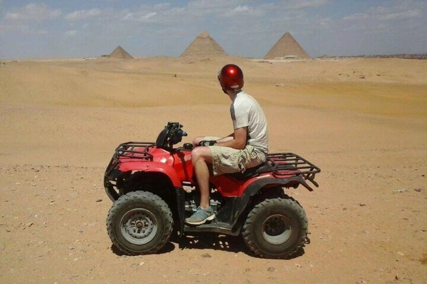 An unforgettable desert ATV experience, surrounded by the incredible beauty of Egypt's famous pyramids.