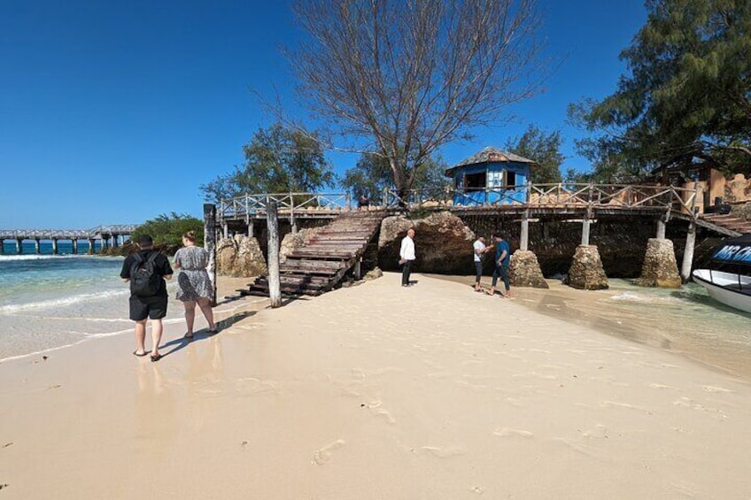 Arriving on the Prison Island beach