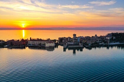 Sirmione Sunset Walking and Boat Tour with a Drink onboard