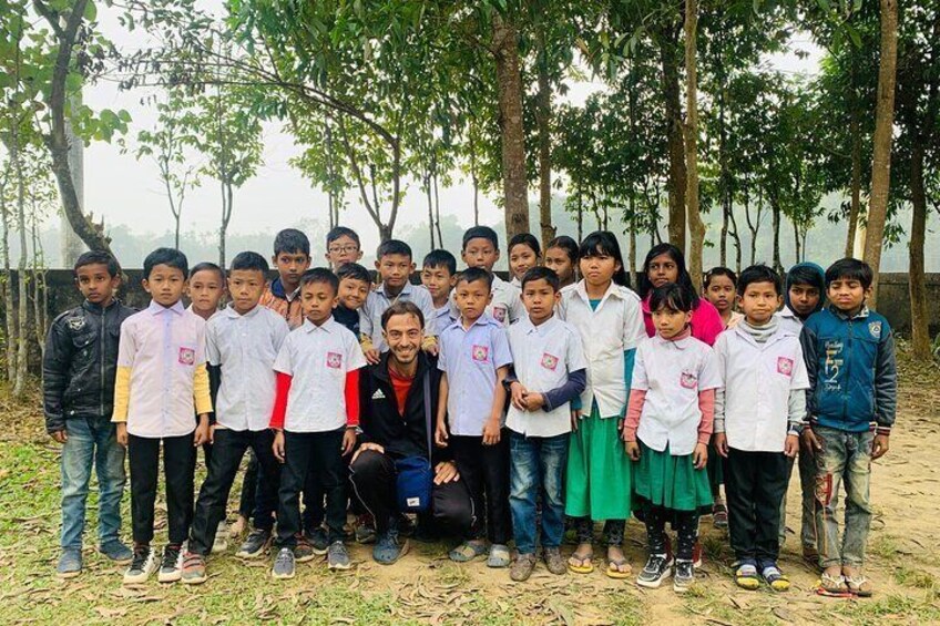 Building Connections | A heartwarming moment with the future of Sylhet. Experience community, education, and meaningful cultural exchange at Charubala Homestay.