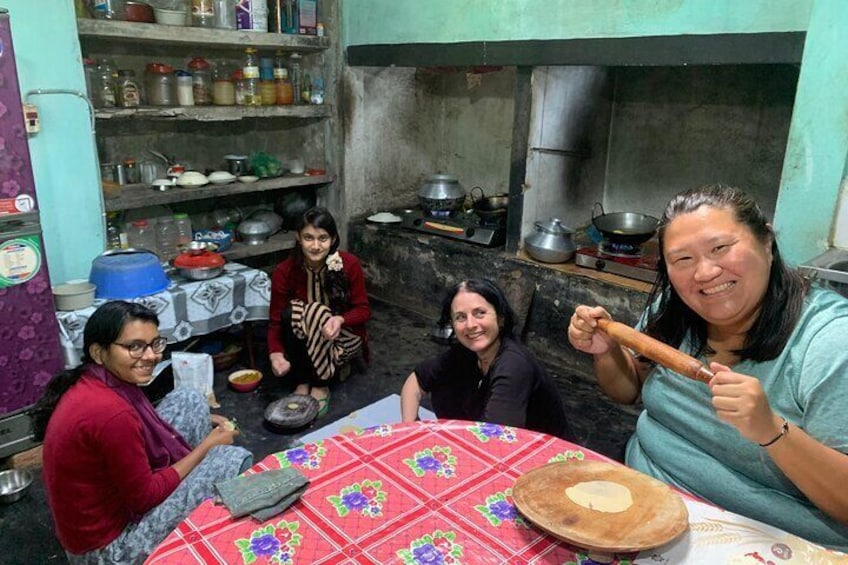 Guests from China and Italy joining in to prepare traditional Bangladeshi dishes, embracing local culture at Charubala Homestay