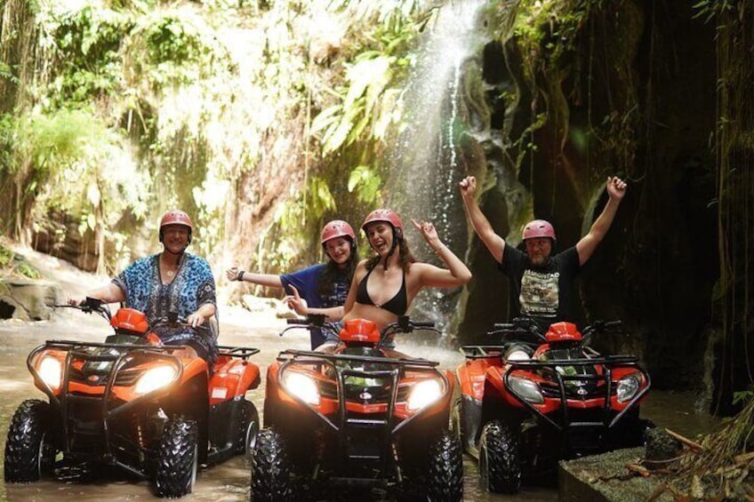 Bali ATV ride through river, tunnel, waterfall, cave and jungle