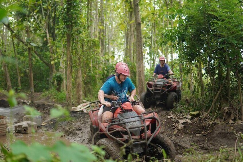 Bali ATV ride through river, tunnel, waterfall, cave and jungle