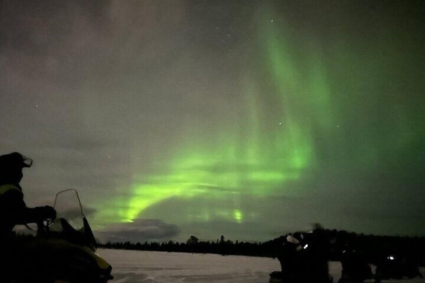 Guided Northern Light snowmobile tour in Kiruna