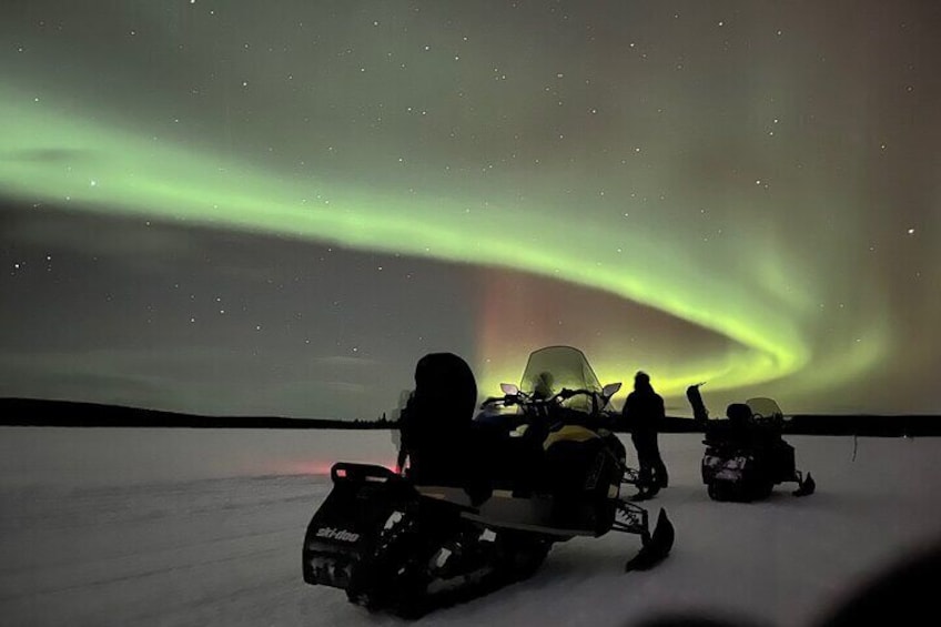 Guided Northern Light snowmobile tour in Kiruna