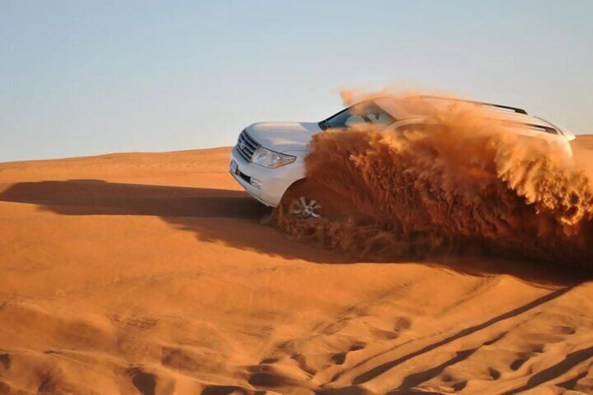 Dubai Desert Safari Dune Bashing ,Sandboarding and BBQ Dinner