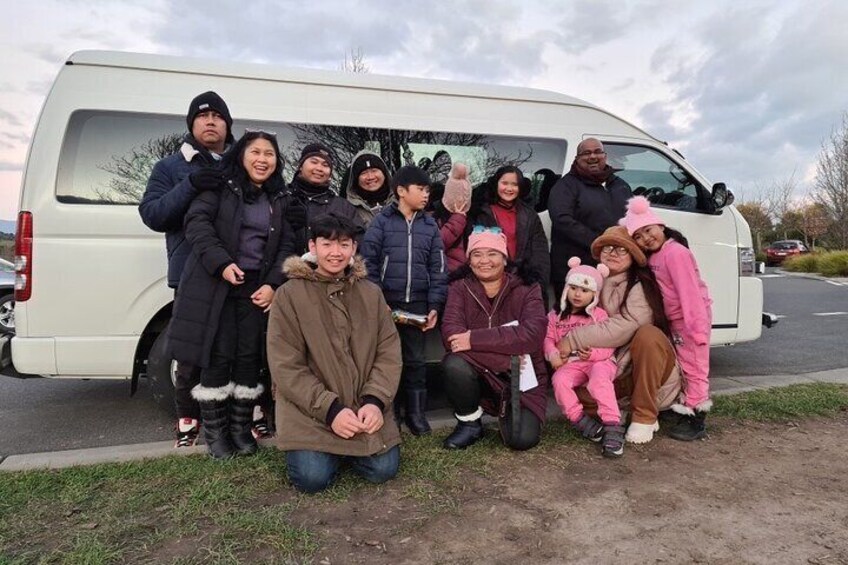 A cheerful group of happy customers back from Lake Mountain, embracing the snow and creating unforgettable memories together!