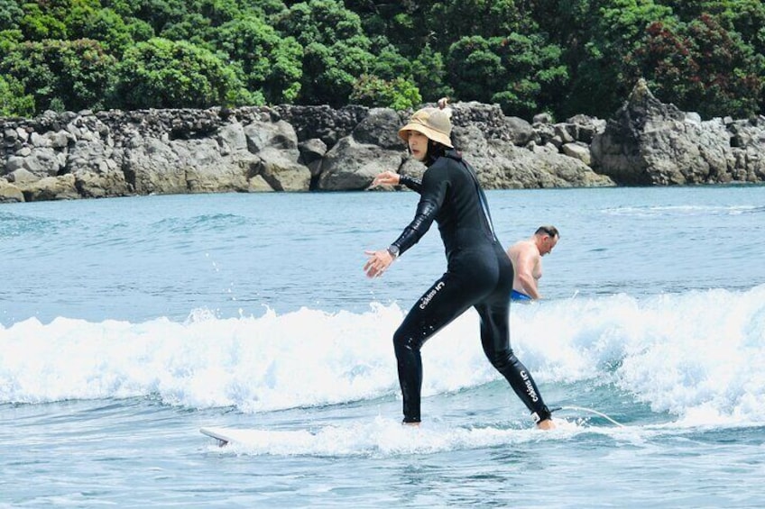 Riding the whitewater to the beach.