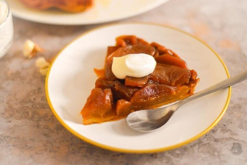 caramelized upside-down apple tart, perfectly paired with a dollop of tangy crème fraîche