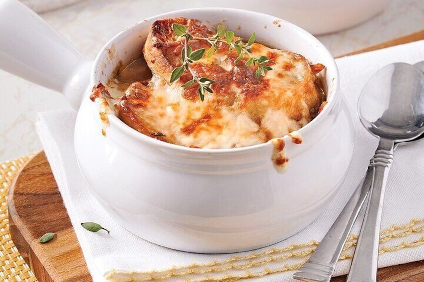 Rich, caramelized onion soup topped with golden melted cheese and crusty bread